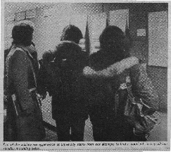 thumbnail of a photo of students looking at a bulletin board with the 
subtitle Part of the anxiety we experience at university stems from our attempts 
to find a good job to pay off our steadily mounting debts